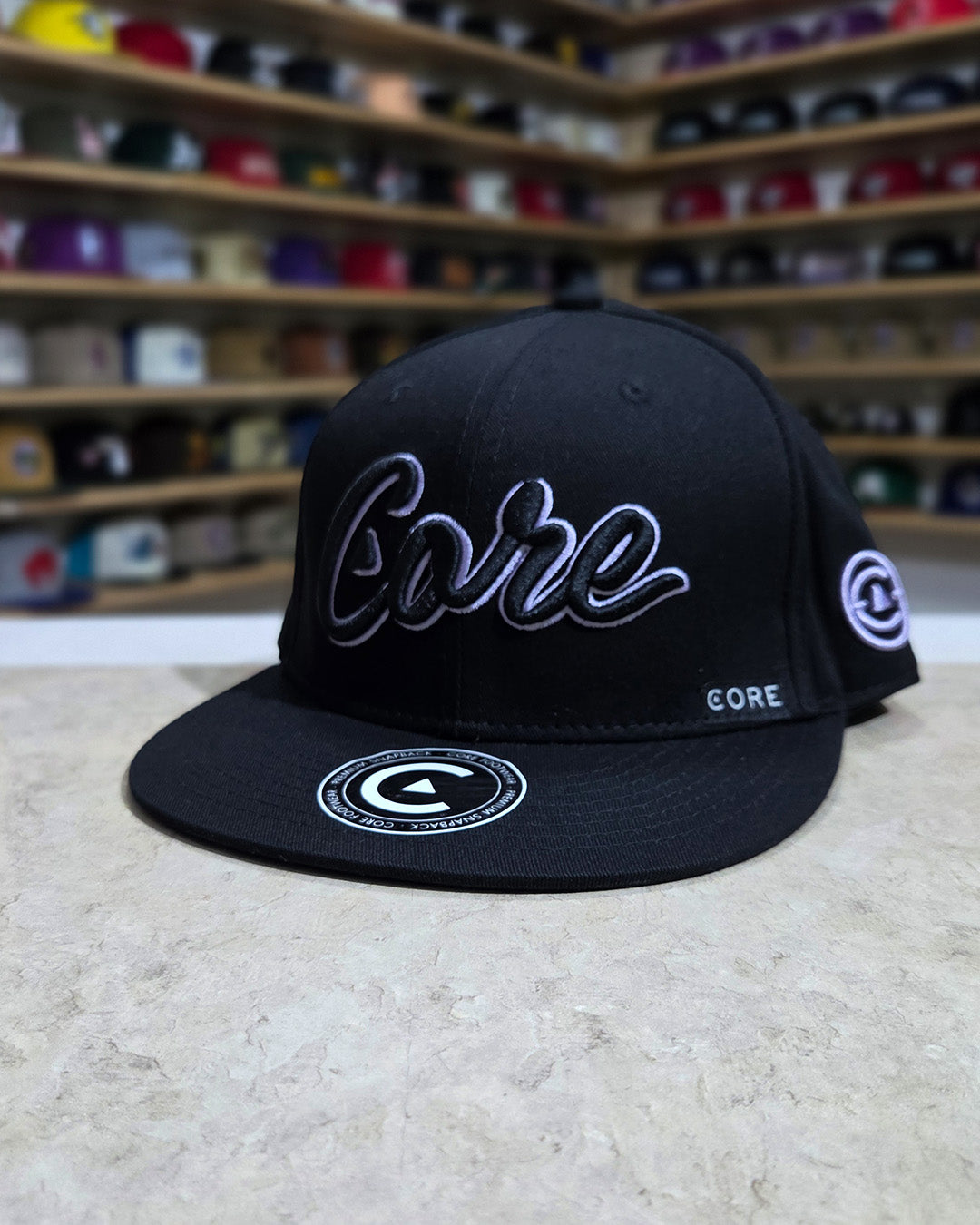 Core Footwear - Snapback Script