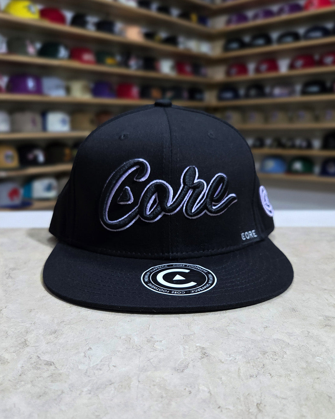 Core Footwear - Snapback Script