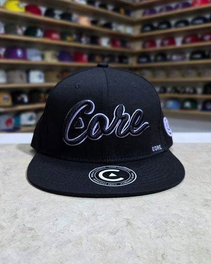 Core Footwear - Snapback Script
