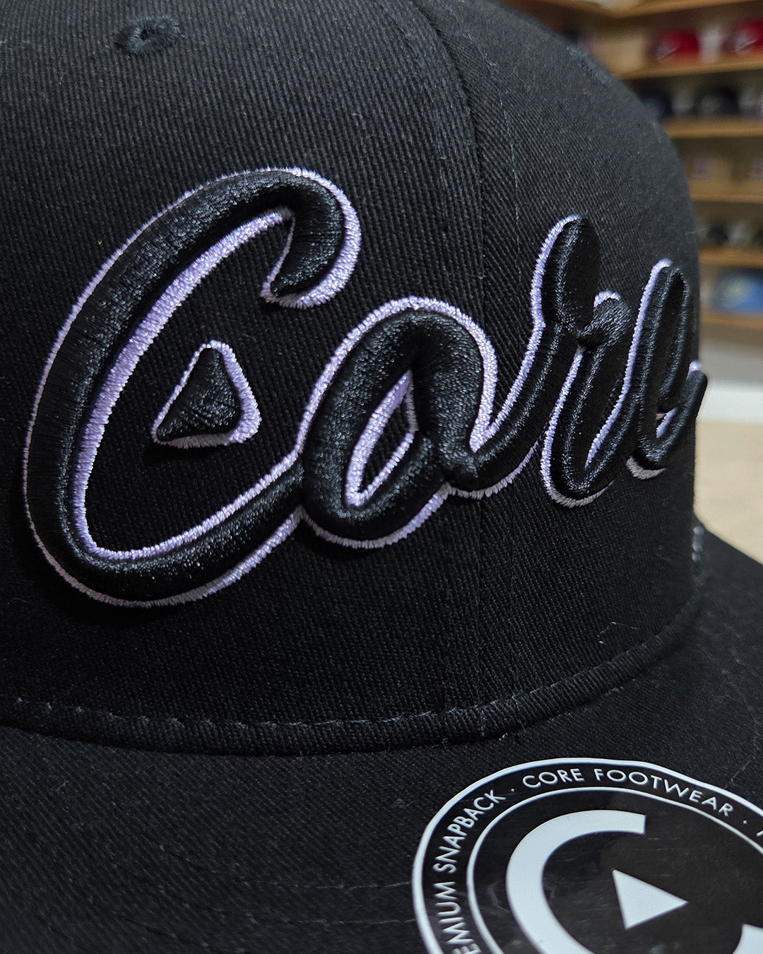 Core Footwear - Snapback Script
